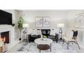 Stylish living room boasts a fireplace, comfortable seating, and chic decor for a cozy atmosphere at 5300 E Cherry Creek South Dr # 620, Denver, CO 80246