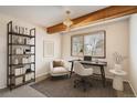 Cozy office space with natural light, comfortable seating, and a practical desk area for remote work at 10490 W Jewell Ave # D, Lakewood, CO 80232