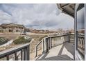 Front porch featuring a view of the neighborhood at 8100 W Quincy Ave # D, Littleton, CO 80123