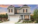 Charming two-story home with stone accents, a two-car garage, and a welcoming front porch at 39733 Penn Rd, Elizabeth, CO 80107