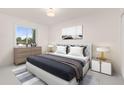 Comfortable bedroom featuring a plush bed, soft lighting, and neutral decor at 3193 W 134Th Cir, Broomfield, CO 80020