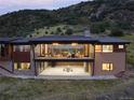 Modern home featuring a large balcony, perfect for enjoying the mountain views at 17401 Snowcreek Ln, Morrison, CO 80465
