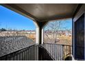 Private balcony with a view of the surrounding neighborhood, offering an ideal space for relaxation and outdoor enjoyment at 6741 S Ivy Way # B4, Centennial, CO 80112