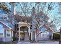 Townhome exterior featuring a private entrance, balcony, and well-maintained landscaping, offering a comfortable residential experience at 6741 S Ivy Way # B4, Centennial, CO 80112