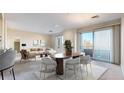 Bright living space features a modern design, neutral tones, and a balcony for outdoor enjoyment at 2500 E Cherry Creek South Dr # 213, Denver, CO 80209
