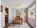 Cozy dining room with a ceiling fan, window, and natural light at 3625 E 128Th Pl, Thornton, CO 80241