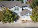 An exterior elevation shows a well-maintained townhome with attached garage, landscaping, and neutral-colored siding at 1355 S Ulster St, Denver, CO 80231