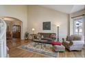 Cozy living room showcasing a neutral palette, hardwood floors, and ample natural light at 3207 Opal Ln, Superior, CO 80027