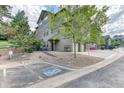 Beautiful townhome with mature landscaping and convenient parking, including accessible spaces at 31112 Black Eagle Dr # 101, Evergreen, CO 80439