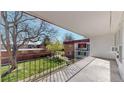 Balcony overlooking a well-maintained courtyard, perfect for relaxation and enjoying outdoor scenery in a tranquil setting at 10185 W 25Th Ave # 31, Lakewood, CO 80215