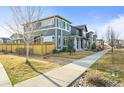 View of neighborhood homes showing sidewalks and shared lawn in a well kept area at 2754 W 69Th Ave, Denver, CO 80221