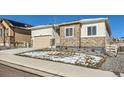 Attractive single-story home with a two-car garage and well-maintained landscaping at 4689 Coltin Trl, Castle Rock, CO 80104