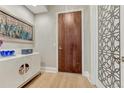 A bright and stylish entryway featuring modern decor, sleek lines, and elegant wood flooring at 7600 Landmark Way # 1514, Greenwood Village, CO 80111