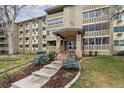 Beautiful exterior view of condo building with well-kept landscaping and welcoming entrance at 350 S Clinton St # 9C, Denver, CO 80247