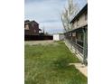 Spacious backyard with healthy green grass, storage shed and wood fencing. Perfect for outdoor activities at 4740 W 108Th Pl, Westminster, CO 80031