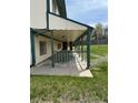 Covered patio area with railings, offering a shaded space for outdoor entertaining and relaxing at 4740 W 108Th Pl, Westminster, CO 80031