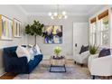 Stylish living room with modern lighting, designer furniture, and elegant decor at 2641 N Clayton St, Denver, CO 80205