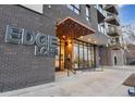 Welcoming entrance to building with decorative awning and convenient access for residents and guests at 1735 Central St # 208, Denver, CO 80211