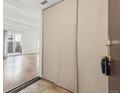 Bright entryway leads to the living area, featuring clean lines and modern design at 9700 E Iliff Ave # G70, Denver, CO 80231