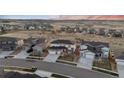 Overhead view of a modern home within a well-planned community and open space at 14373 Shasta Daisy Pt, Parker, CO 80134