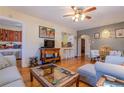 Inviting living room with an open layout, connecting the dining area and bedroom beyond at 1436 N Gilpin St # 2, Denver, CO 80218