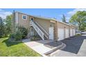 Inviting home featuring a two-story layout, garages, and individual entrances for each unit at 360 S Estes St # C, Lakewood, CO 80228