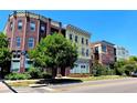 Street view of modern apartment building with attractive architectural details in a vibrant neighborhood at 1521 Central St # 2D, Denver, CO 80211