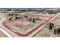 Expansive aerial view highlighting the property's large lot size and the surrounding neighborhood at 34942 Wagon Wheel Trl, Elizabeth, CO 80107