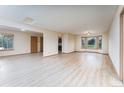 Bright living space with wood-look floors and abundant natural light at 3840 Sierra Vista Rd, Monument, CO 80132