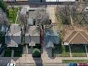 An aerial view of a residential neighborhood, showcasing the layout and surrounding greenery at 3225 S Lincoln St, Englewood, CO 80113