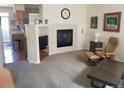 Cozy living room features a fireplace and comfortable seating at 2240 S Pagosa Ct # B, Aurora, CO 80013