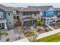 An aerial view of a well-maintained home with a landscaped yard in a suburban neighborhood at 21482 E 60Th Ave, Aurora, CO 80019