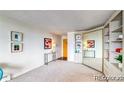 Spacious entryway with built-in shelving and mirror at 4800 E Hale Pkwy # 709N, Denver, CO 80220
