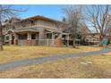 Serene backyard featuring a gravel path and fenced-in area, perfect for outdoor enjoyment at 275 Pontiac St, Denver, CO 80220