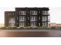 Contemporary townhomes featuring a mix of black and light gray finishes at 5128 W 26Th Ave # 208, Denver, CO 80212