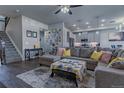 Bright, open living room featuring hardwood floors and modern decor at 12254 Hazel Spruce Ct, Parker, CO 80134