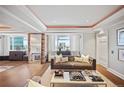 Bright living room with a view, featuring hardwood floors and stylish, neutral décor at 1891 Curtis St # 1812, Denver, CO 80202