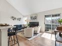 Open concept living area with natural light and a modern design at 11195 Alcott St # D, Westminster, CO 80234