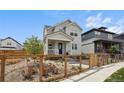 Attractive home featuring a fenced front yard and a welcoming entrance at 2862 E 103Rd Ave, Denver, CO 80229
