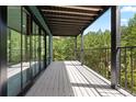 Spacious balcony with metal railing and tree views at 205 Loop Dr, Georgetown, CO 80444