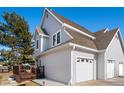 Two-story home with attached garage and deck at 8117 W 90Th Dr, Westminster, CO 80021