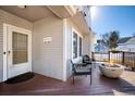 Inviting front patio with firepit and seating area at 8117 W 90Th Dr, Westminster, CO 80021