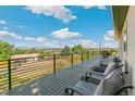Relax on this spacious deck with seating, and enjoy breathtaking views of the surrounding landscape at 5385 W 51St Ave, Denver, CO 80212