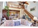 Comfortable living room with an open floor plan to the kitchen at 2685 S Dayton Way # 141, Denver, CO 80231