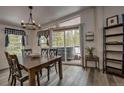 Bright dining room with slider to the hot tub deck at 492 Kimmes Ln, Breckenridge, CO 80424
