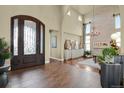 Grand entryway with tile floors, high ceilings, and a stunning door at 10510 Ladera Dr, Lone Tree, CO 80124