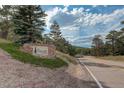 Entrance to the Village at Genesee community at 23619 Genesee Village Rd # B, Golden, CO 80401