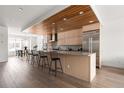 Modern kitchen with island and stainless steel appliances at 63 S Jackson St, Denver, CO 80209