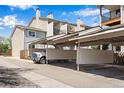 Assigned covered parking spots in an open lot; easy access and protection from the elements at 7845 Barbara Ann Dr # J, Arvada, CO 80004