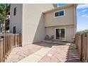 Private outdoor patio featuring a stone paved area, providing a great space for relaxation at 7845 Barbara Ann Dr # J, Arvada, CO 80004